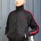 Trainingsjacke Track Jacket KINGSLEAGUE (black/schwarz mit rotem Streifen)