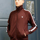 Trainingsjacke Track Jacket KINGSLEAGUE (brown braun mit weissen Streifen)