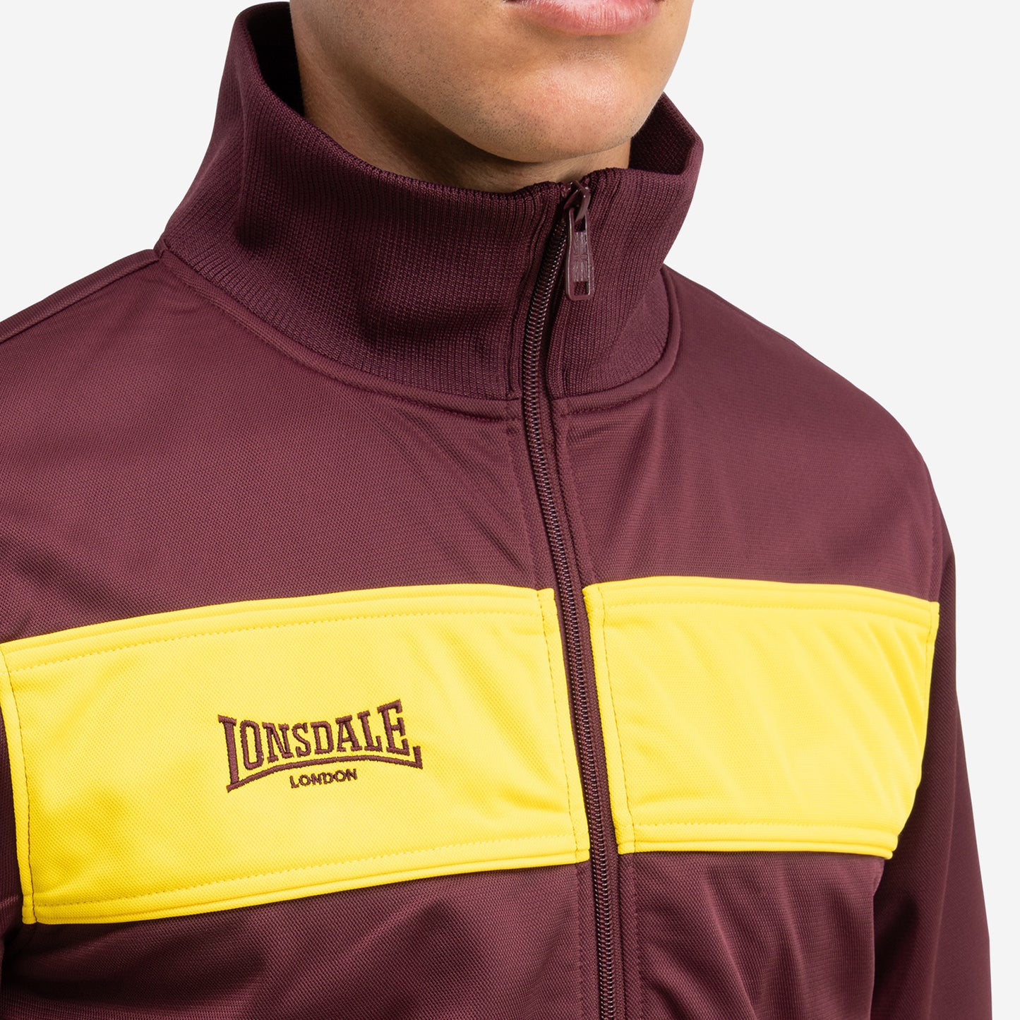 LONSDALE Trainingsjacke - Track Jacket mit farblich abgesetzten Panel (burgundy - yellow)