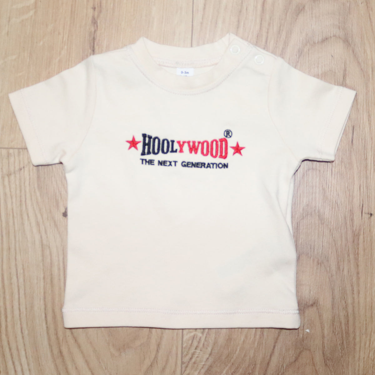 HOOLYWOOD Baby T-Shirt THE NEXT GENERATION hochwärtiger zweifarbiger Stick Made in Germany (beige)